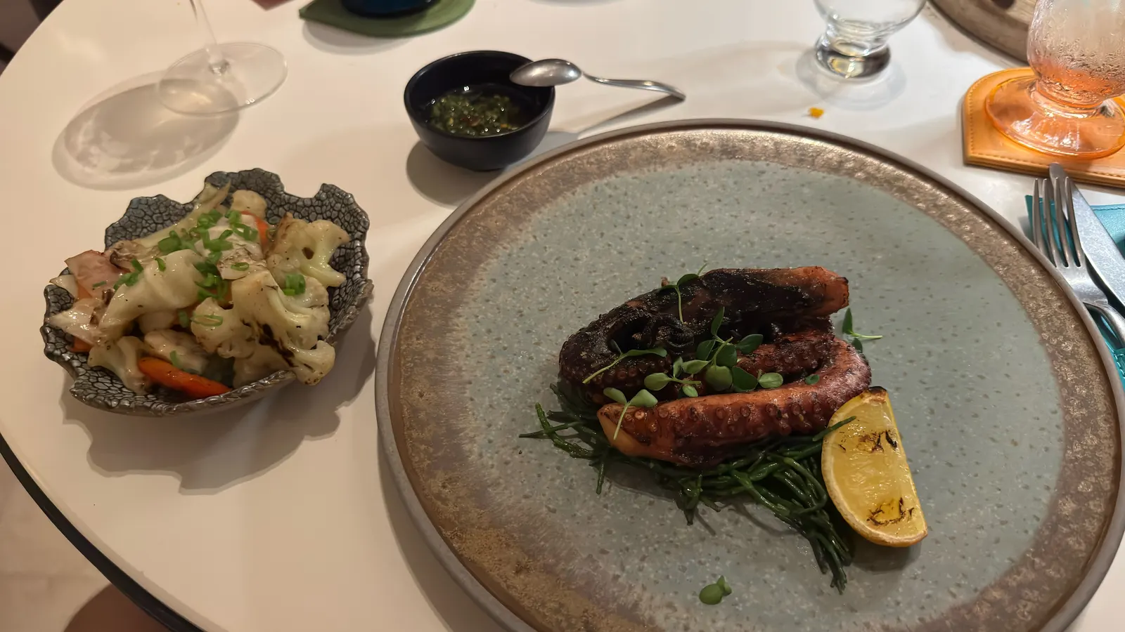 Delicious Grilled Octopus, Curry, Empanadas, and bread… amazing Creole cuisine experience!