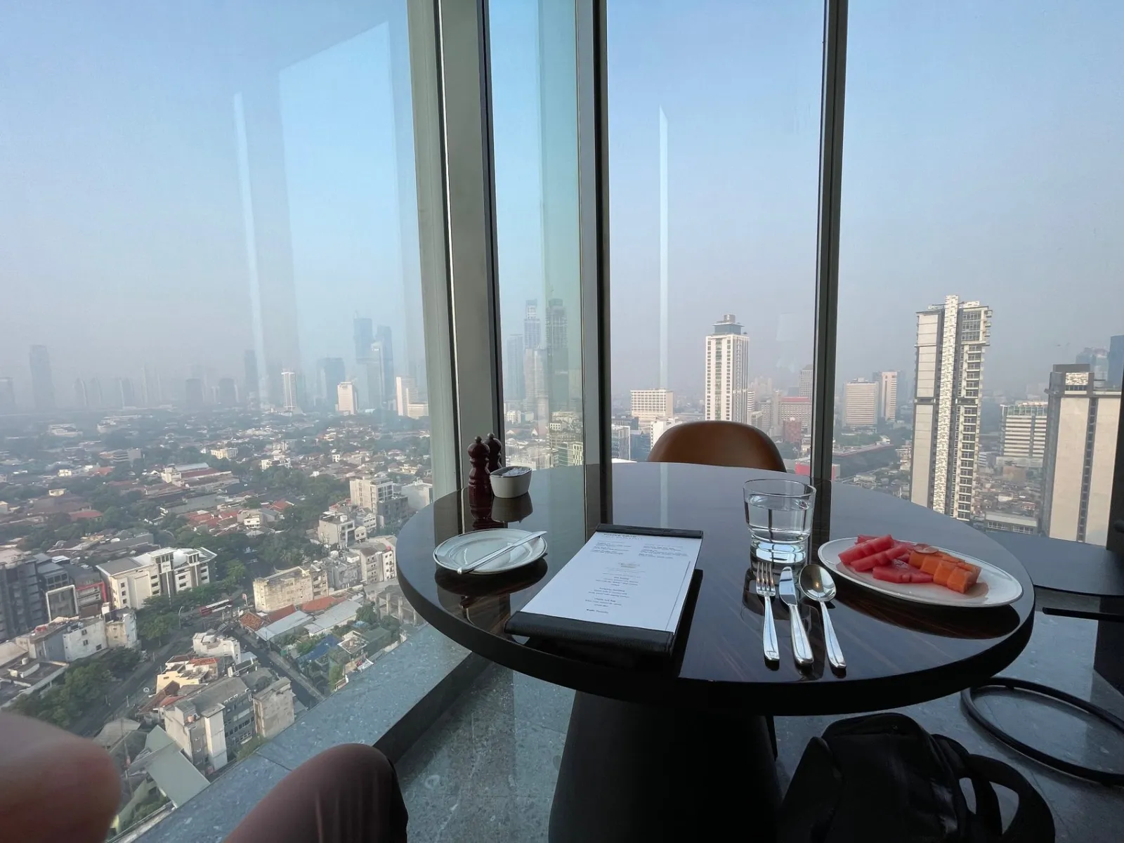 Breakfast with a view! My table overlooking the Jakarta skyline.